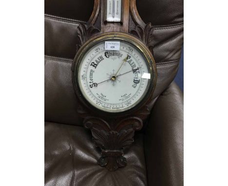 CARVED OAK BAROMETER