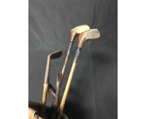 ANTIQUE HICKORY GOLF CLUBS including Gordon Lockhart Gleneagles shaft driver, a Prestwick driver, jigger putter, Dunlop putte