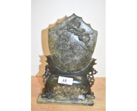 A Chinese carved green stone table screen having pierced decoration with high-relief carving of cranes and pine trees, h23cm.