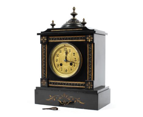 A French black slate mantle clock with gilt detail, gilt brass face and Arabic markers, with unmarked movement, striking on a