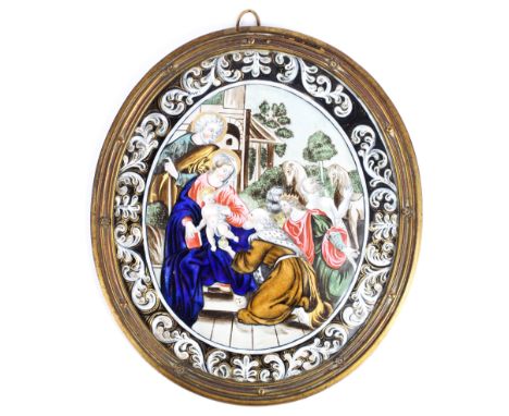 A Limoges enamel oval plaque, in the 17th century style, decorated with the Adoration of the Magi, within a black ground bord