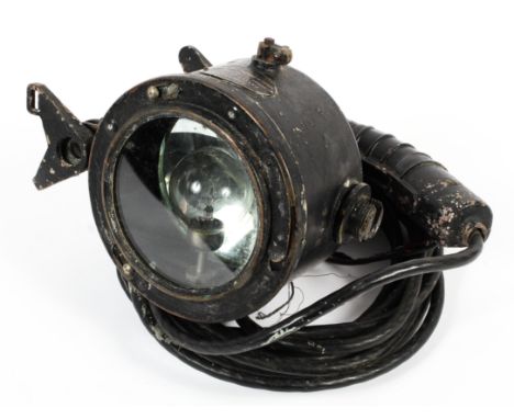 A ship's signaller lamp with maker's plaque: Admiralty, Pattern 511E lantern portable signaller, 1945 