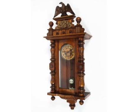 A late 19th century Vienna regulator wall clock in the style of Gustav Becker, with striking movement, bronzed eagle finial a