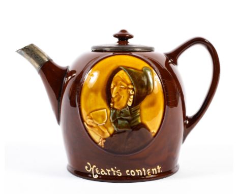 A Royal Doulton novelty 'Hearts Content' silver mounted teapot and cover, the spout hallmarked London, 1928, the teapot with 