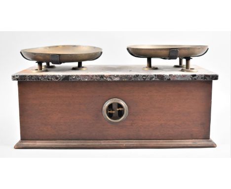 A Continental Marble Topped Pan Scale Balance with Centre Arrow Indicators to Front and Rear, 42cm Wide 