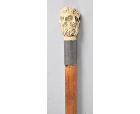 An Early Mid 20th Century Bamboo Sword Stick, The Handle Moulded in the Round with Six Masks of Classical Gents, 88cm high Lo