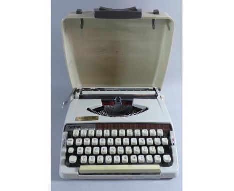 A Vintage Manual Portable Deluxe 900 Typewriter 