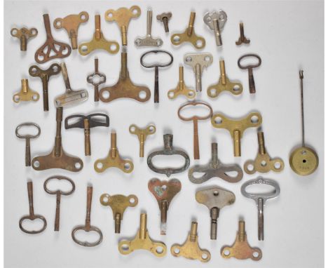 A Collection of Approximately Forty Vintage Clock Keys 
