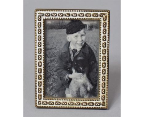 A Early/Mid 20th Century Miniature Easel Back Photo Frame with White Enamel Decoration, 6cm high 
