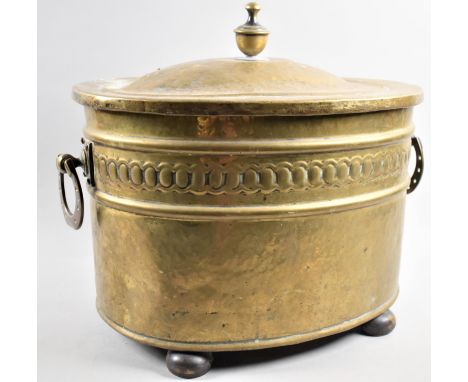 A Mid 20th Century Oval Brass Coal Box with Horseshoe Side Carrying Handle and Vase Finial, 43cm wide 