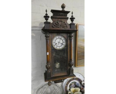 A Mahogany Vienna Style Wall Clock with Enamelled Dial and with 8 Day Movement, 23cm wide x 56cm High 