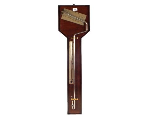 A Mahogany inlaid cased shaped glass barometer and thermometer