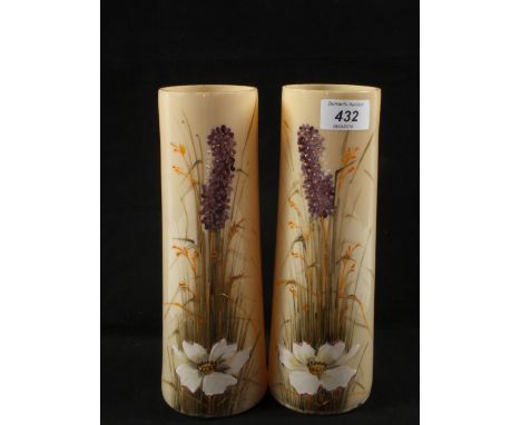 A pair of Victorian opal glass floral painted vases