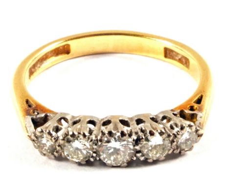 An 18ct Gold five stone Diamond ring, size M