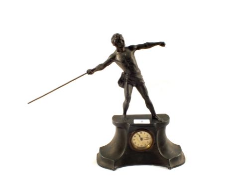 A spelter mantel clock with Greek warrior mount