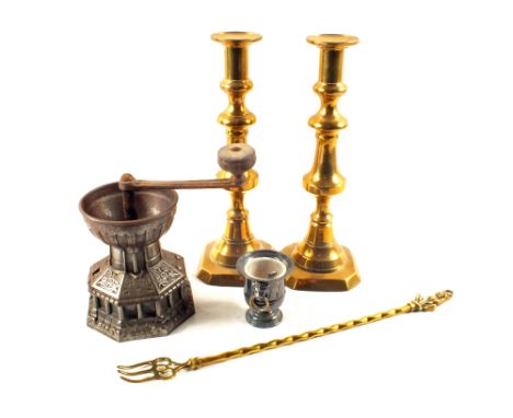 A vintage iron coffee mill, maker A.K & Sons plus Victorian Brass candlesticks etc