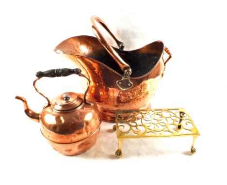 A Victorian Copper kettle, coal helmet and a Brass trivet