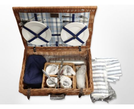 An Optima wicker picnic hamper and contents.