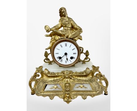 A 19th century French alabaster and gilt metal figural mantel clock, striking on a bell, with pendulum and key, height 30cm. 