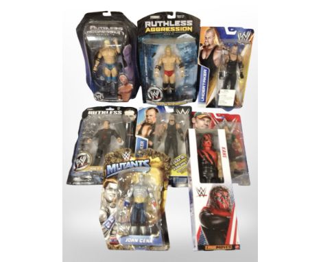 Eight Mattel and other Wrestling figurines, boxed.