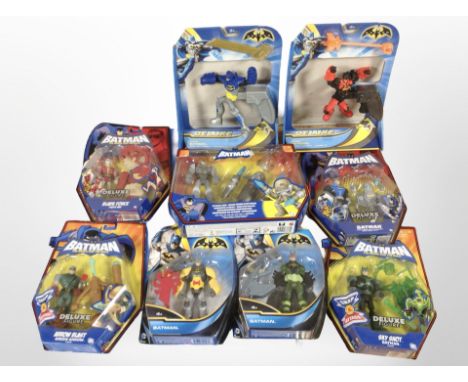 Nine Mattel Batman figurines, boxed.