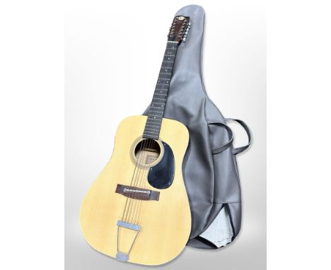 A vintage circa 1970 Kay 12-string acoustic guitar in soft carry bag.