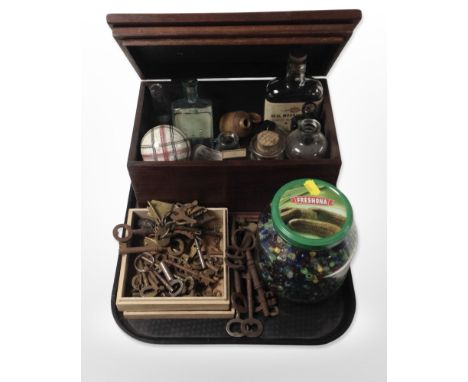 A collection of antique keys, jar containing a large quantity of glass beads, antique chemist's bottles, a Victorian ceramic 