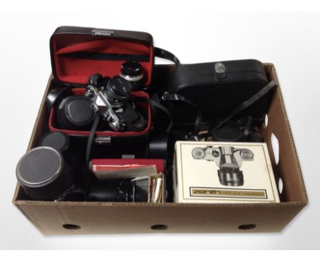 A group of cameras including Pentax ME Zenith Reflex camera, various lenses, accessories and camera cases. (1 box)