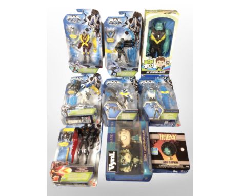 A group of nine Mattel, Funko and other figures including Max Steel, Ben 10, etc.