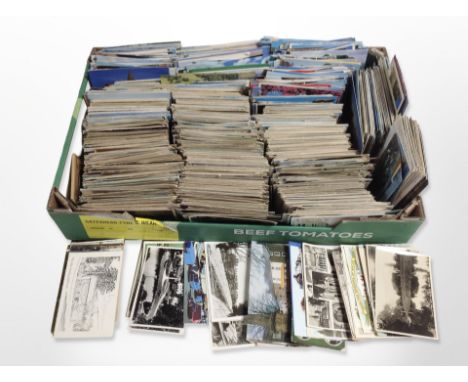 A large quantity of vintage and modern postcards. (1 box)