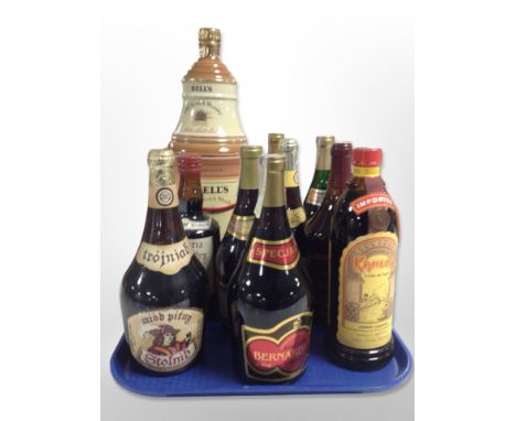 A Bell's Old Scotch Whisky decanter, 75cl, 43% vol, in carton, together with several other bottles of continental liqueur, me