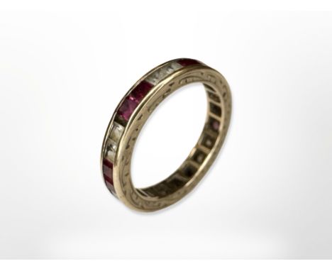 A 9ct yellow gold synthetic ruby and diamond full eternity ring, size I/J. CONDITION REPORT: 2g.