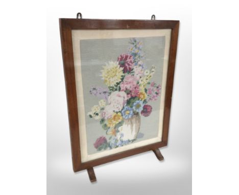A tapestry fire screen, height 70 cm 