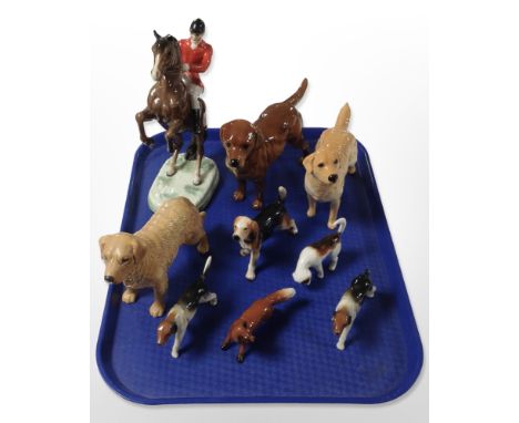 A Beswick figure of a huntsman on rearing horse, No. 868 (ear chipped), together with several other Beswick and Goebel figure