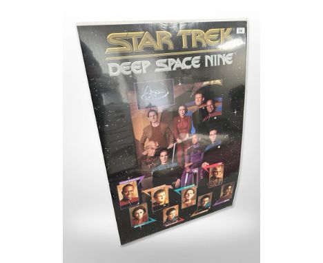 Vintage WWII photos of fighter jets, early 20th century steam trains, a 1950's newspaper and a vintage Star Trek poster attac