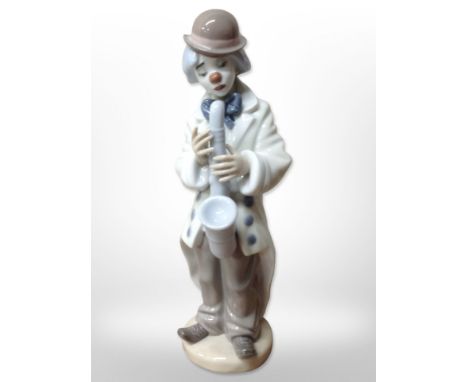 A Lladró clown playing a saxophone, No.5471.