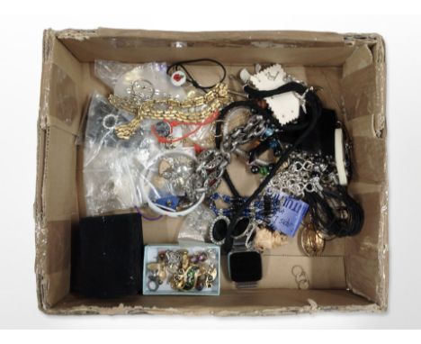 A box of assorted costume jewellery, digital wrist watch, trinkets.