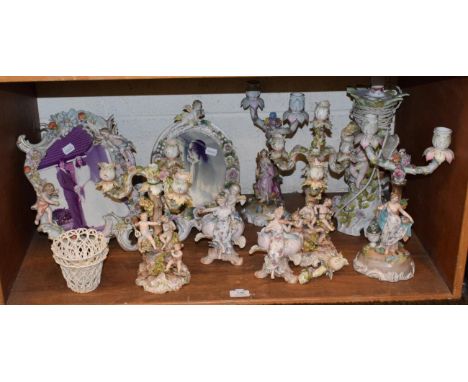 Quantity of floral encrusted and figural Dresden porcelain, including twin light candelabra, KPM figural posy vases etc 