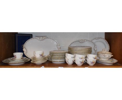 A Limoges dinner service with floral borders together with eight Royal Worcester tea cups and saucers and a Thomas Webbe cand