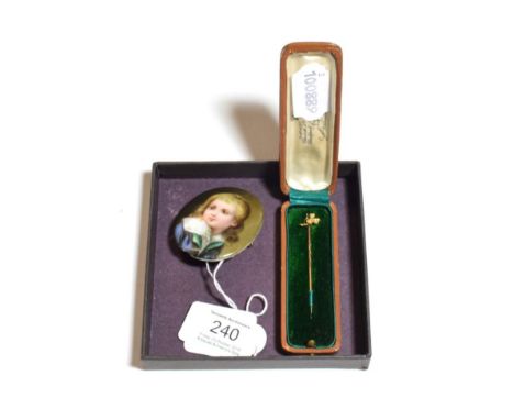 A seed pearl stick pin, stamped '15CT'; and a porcelain miniature brooch.  Stick pin - 1.3 grams. 