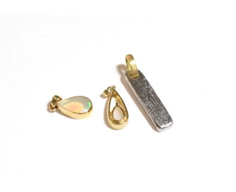 A 9 carat gold opal pendant, length 2.4cm; an opal pendant, unmarked, length 2cm; and another pendant, unmarked, length 3.5cm