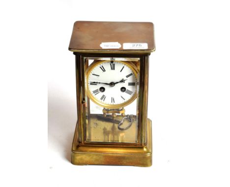 A brass four glass striking mantle clock, circa 1900