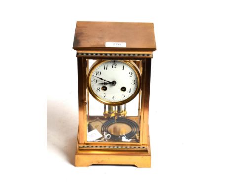 A brass and champleve enamel four glass striking mantel clock, circa 1900, champleve enamel borders, bevelled glass panels, e