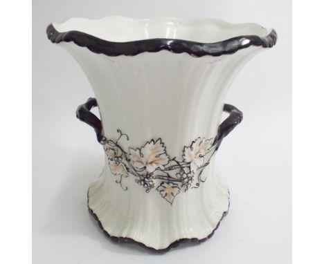 Victorian black and white cache pot with twin handles decorated with fruiting vines and twin handles, unmarked to the base - 
