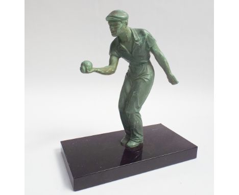 Verdigris finished spelter model of a man playing boules on a black marble base approx 20cm tall 