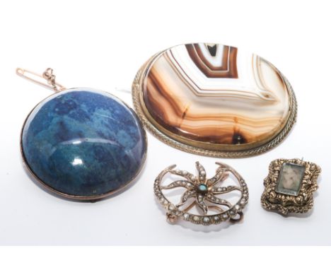 Group of four 19th century and later brooches to include oval banded agate, a mourning brooch with woven hair panel, circular
