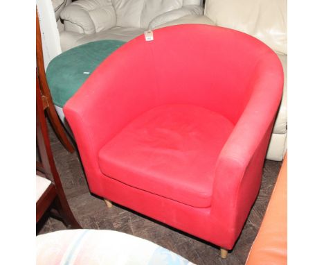 1960's tub shaped red upholstered easy chair and a similar pouffe with green seat 