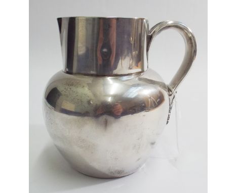 Hallmarked silver Pint jug marked to bottom Rowell Oxford Sheffield 1893-4 and bears very worn inscription.  Approx 10 oz tro