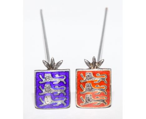 Pair of silver and enamel hat pins, decorated with heraldic three lions on red and blue ground.  23 cms long, red enamel top 