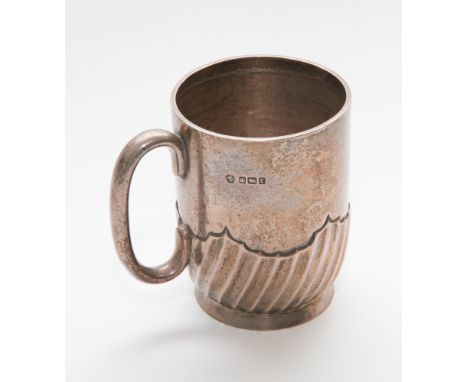 Early 20th century silver christening tankard of half lobe design, plain without inscription Sheffield 1909, 4oz troy